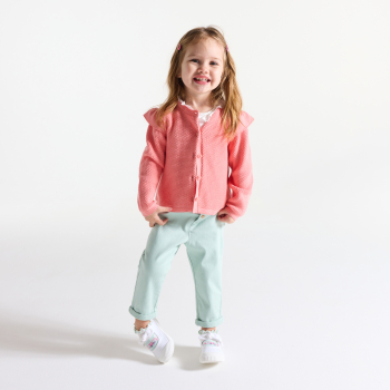 سترة فاخرة من التريكو مع كشكشة، باللون البرتقالي اللامع للفتيات الصغيرات